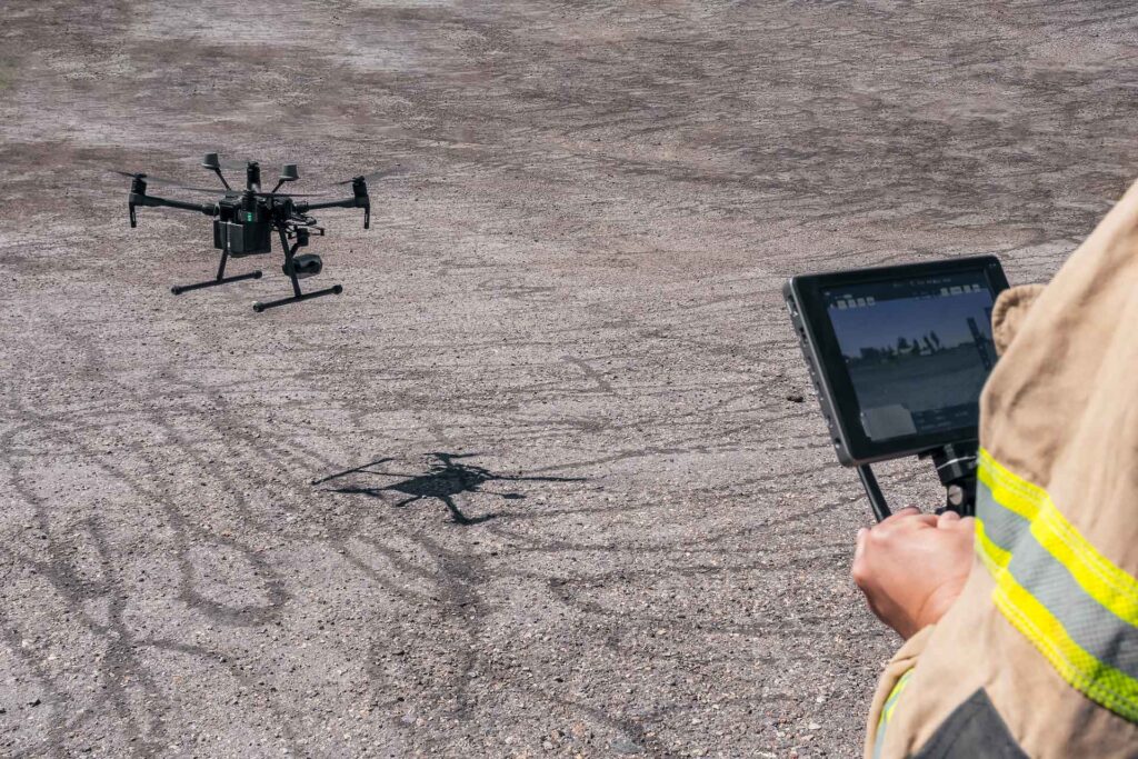 technician operating a drone